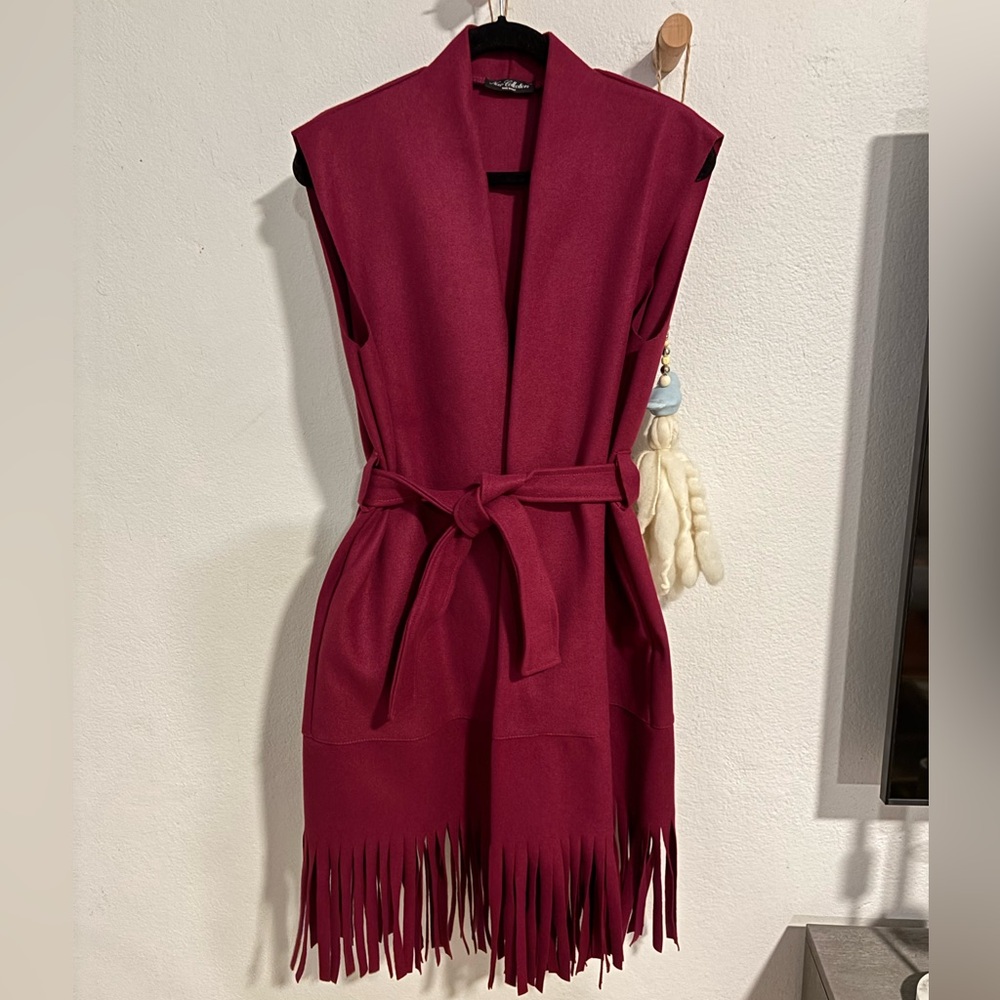 Beautiful and trendy long fringe vest from Italty